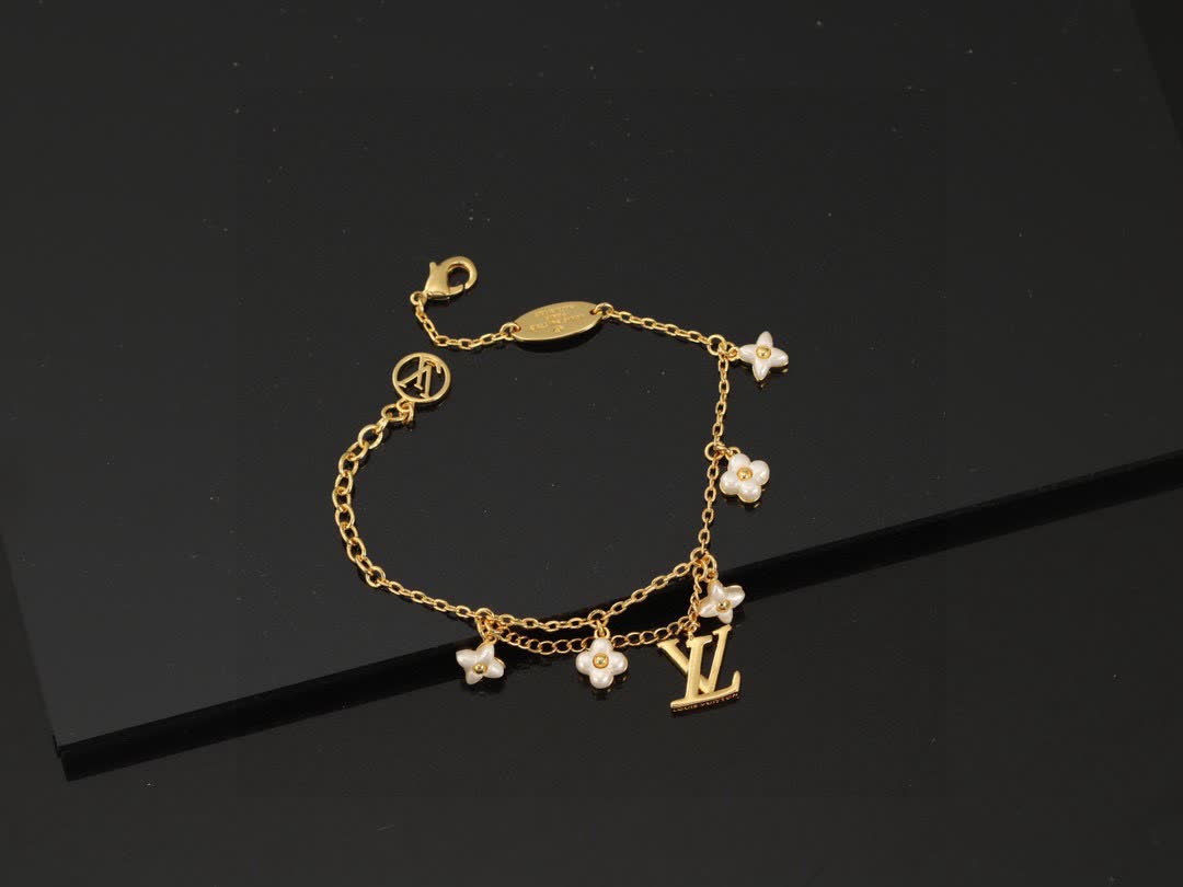 Louis Vuitton Gold Tone Bracelet with Pearls and Logo